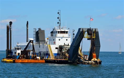 what does a dredger carry